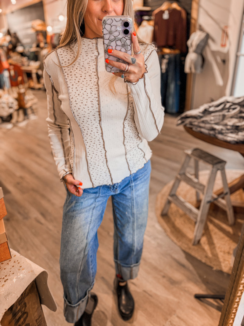 miss me cream long sleeve top with textured panels and contrast stitching, style with cuffed jeans and black boots .